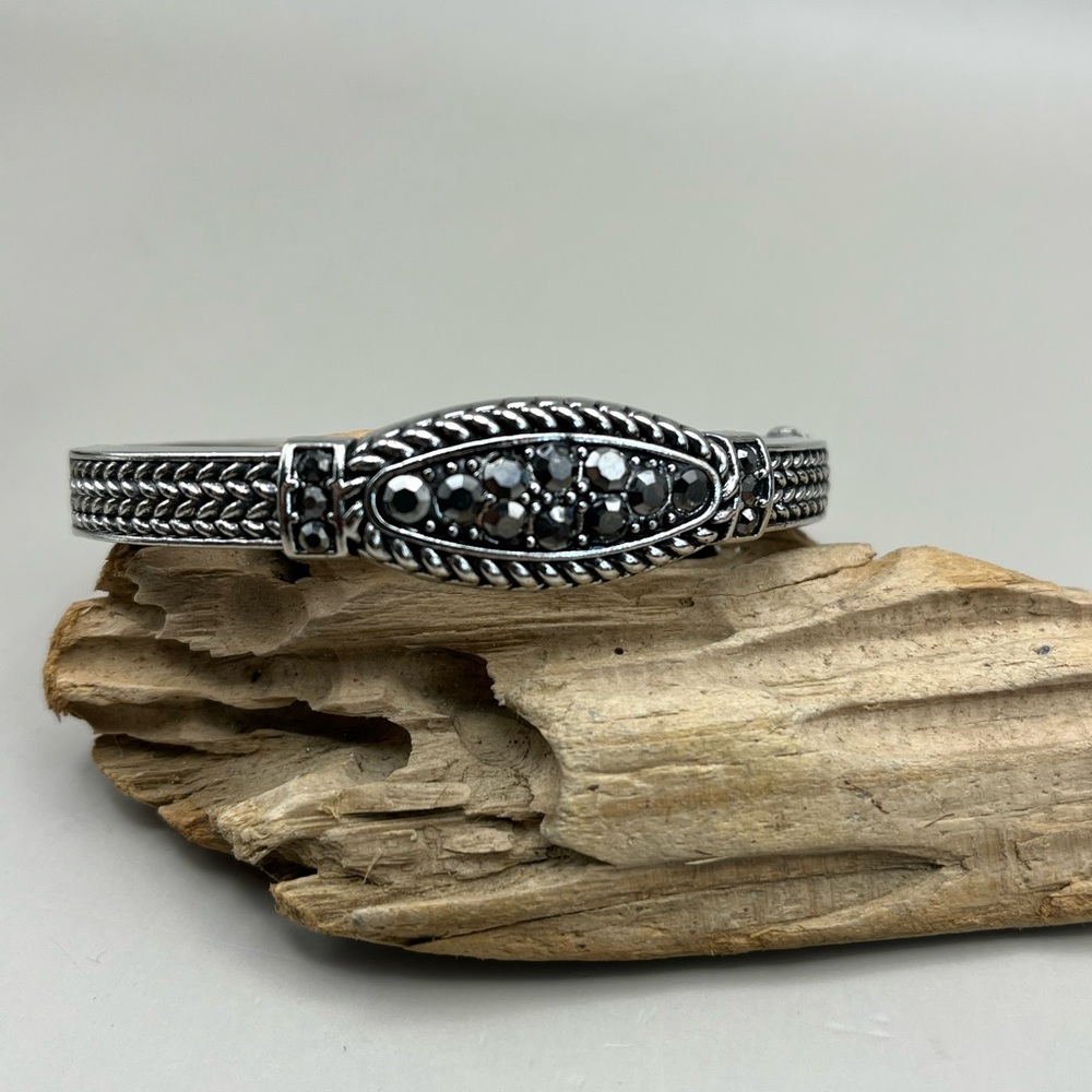 Elegant Silver Hinged Bracelet with Black Accents